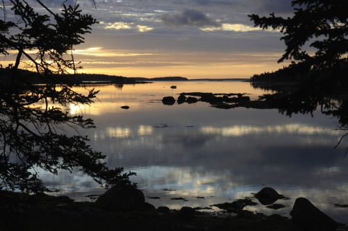  Sunrise over Eggemogin Reach and Greenlaw Cove with clouds reflected in still water. Deer Isle, Maine by Jerry Levitt